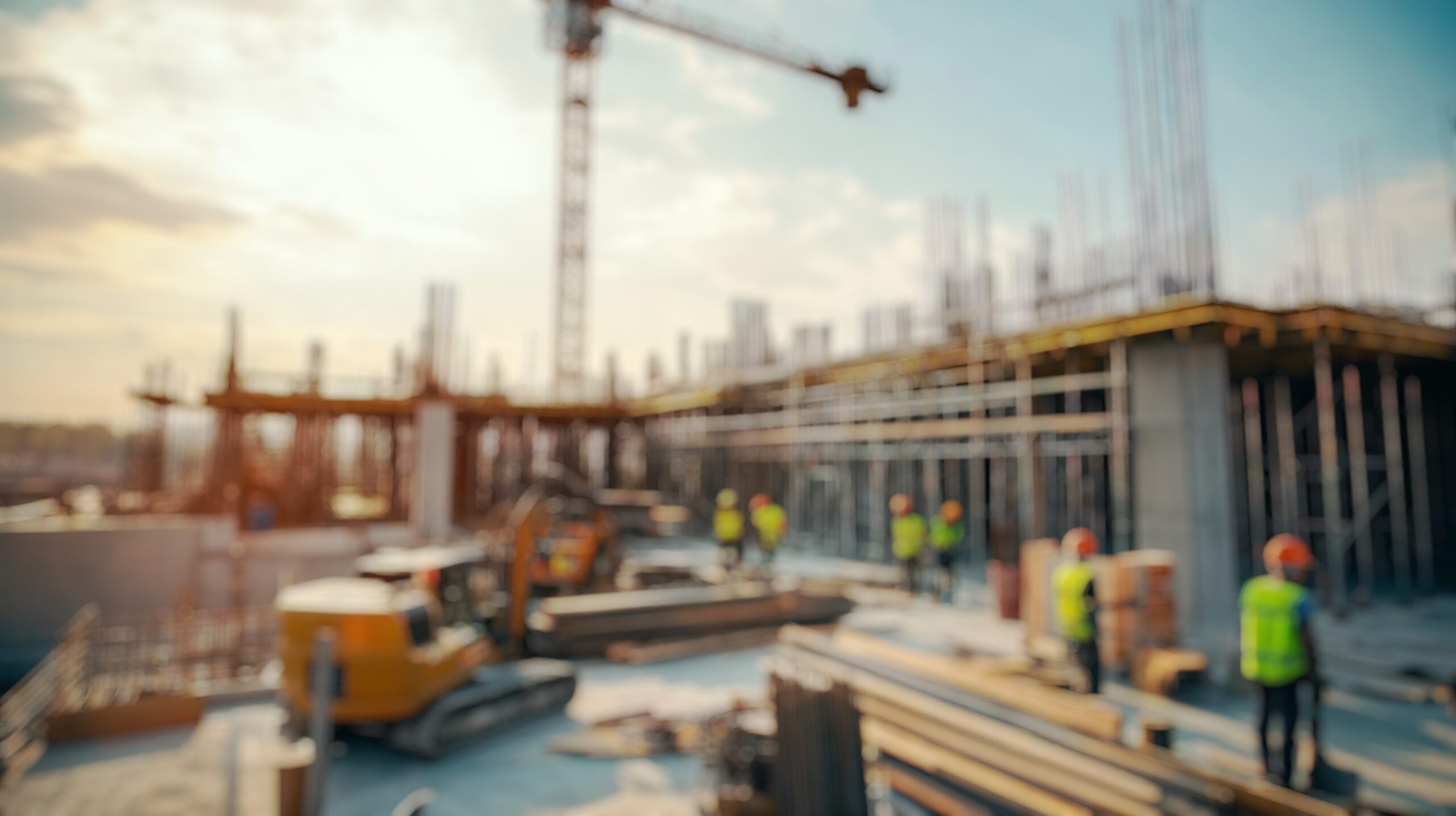 Blurred,Background,Of,A,Bustling,Construction,Site,At,Midday,Showcases