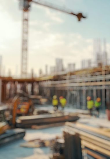 Blurred,Background,Of,A,Bustling,Construction,Site,At,Midday,Showcases